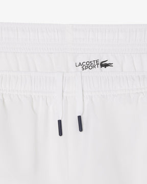 Conjunto branco e azul com logo